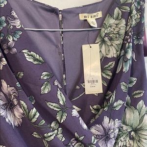 NWT Francesca’s purple wide leg floral jumpsuit